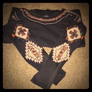 Sweater with beaded designs